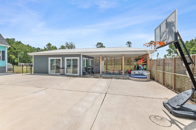 rear view of property with a patio area