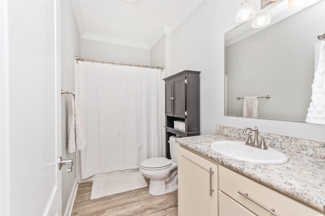 bathroom with vanity, walk in shower, wood-type flooring, ornamental molding, and toilet