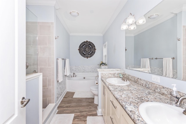 full bathroom with vanity, toilet, ornamental molding, independent shower and bath, and hardwood / wood-style floors