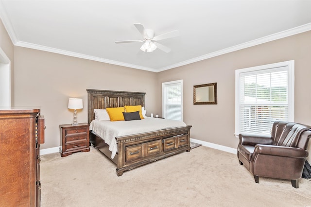 bedroom with ornamental molding, light carpet, and ceiling fan