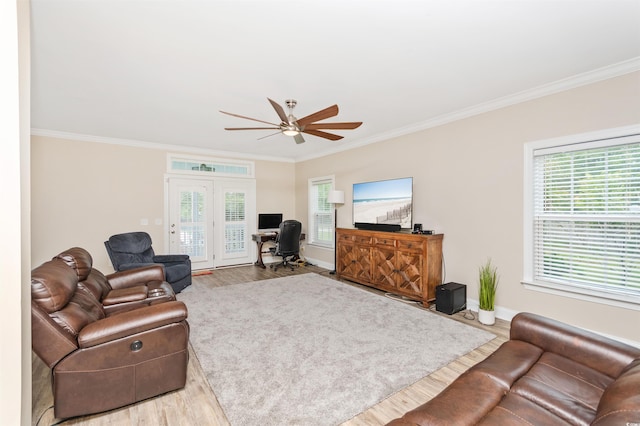 living room featuring ornamental molding, ceiling fan, and hardwood / wood-style flooring