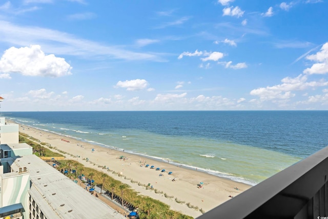 view of water feature with a beach view