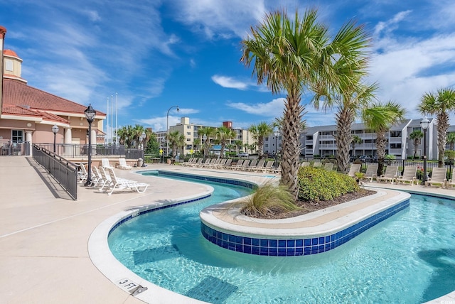 view of pool featuring a patio area