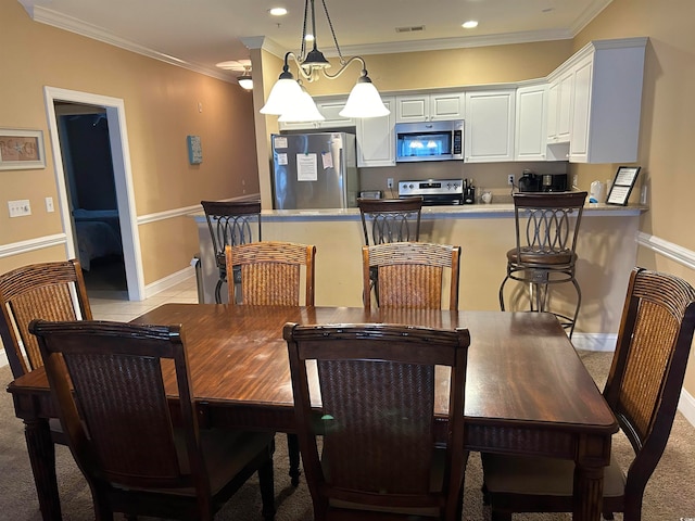 carpeted dining room with crown molding