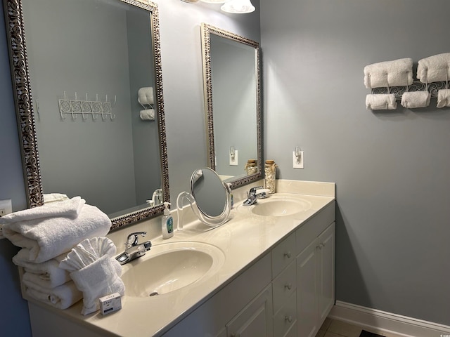 bathroom featuring tile patterned floors and vanity