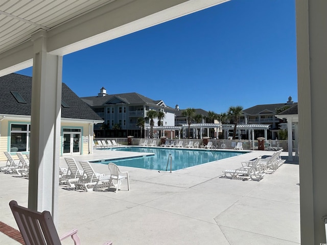 view of swimming pool featuring a patio