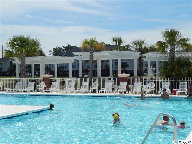 view of pool featuring a pergola