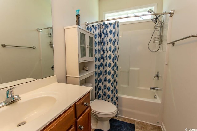 full bathroom with shower / bath combo with shower curtain, vanity, and toilet