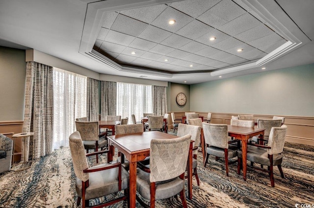 dining area featuring a tray ceiling