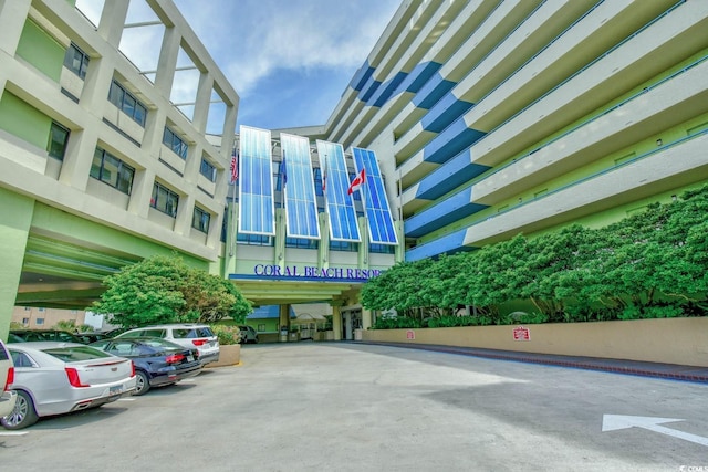 1105 S Ocean Blvd Unit 1044, Myrtle Beach, SC 29577 - view of property featuring uncovered parking