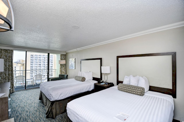 1105 S Ocean Blvd Unit 1044, Myrtle Beach, SC 29577 - bedroom featuring a textured ceiling, ornamental molding, access to outside, and carpet floors
