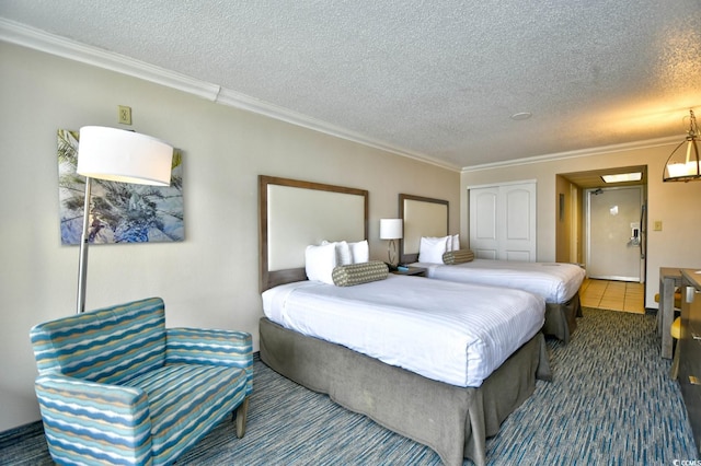 1105 S Ocean Blvd Unit 1044, Myrtle Beach, SC 29577 - bedroom with crown molding, a textured ceiling, and dark colored carpet