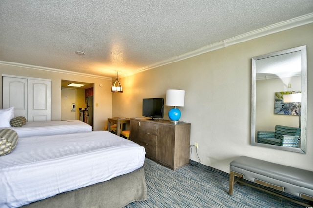 1105 S Ocean Blvd Unit 1044, Myrtle Beach, SC 29577 - carpeted bedroom featuring a textured ceiling and crown molding