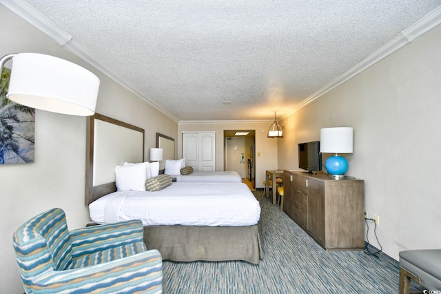 1105 S Ocean Blvd Unit 1044, Myrtle Beach, SC 29577 - carpeted bedroom with a textured ceiling and crown molding