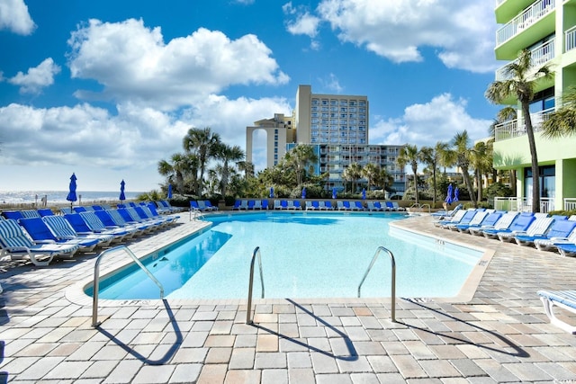 1105 S Ocean Blvd Unit 1044, Myrtle Beach, SC 29577 - community pool featuring a patio area