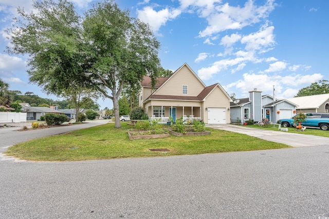 1356 Tranquility Ln, Myrtle Beach, SC 29577 - traditional-style home featuring driveway, a front yard, an attached garage, and a residential view