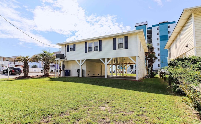 view of front of property featuring a carport and a front lawn