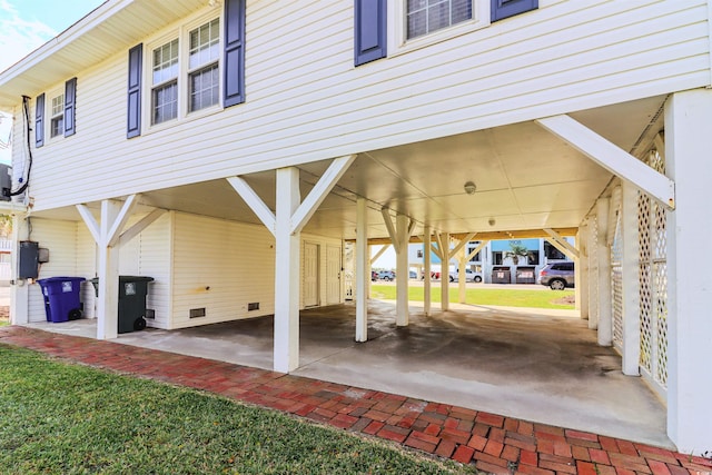 view of patio / terrace featuring a carport