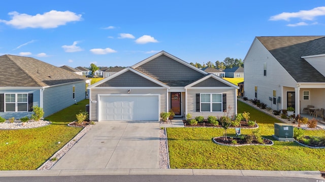 view of front of house featuring a garage and a front yard