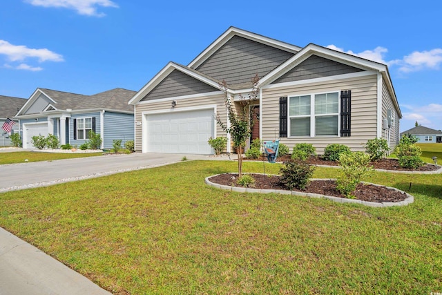 view of front facade with a garage and a front yard