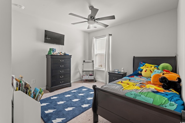 carpeted bedroom featuring ceiling fan