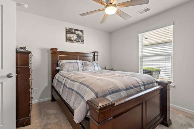 bedroom with ceiling fan and carpet floors