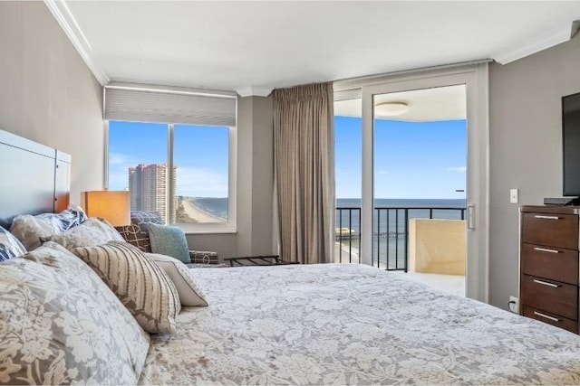 bedroom with expansive windows and ornamental molding