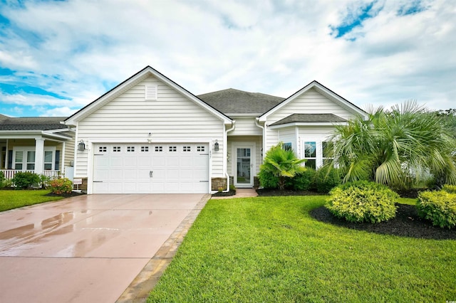 ranch-style house featuring a front lawn and a garage