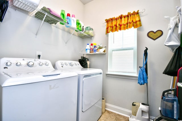 laundry room featuring washing machine and dryer