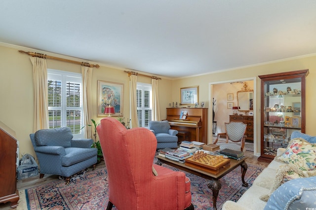 living room featuring crown molding and wood-type flooring