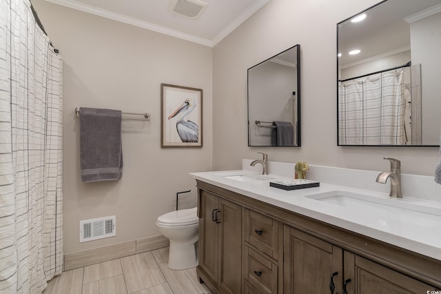 bathroom featuring vanity, ornamental molding, walk in shower, and toilet