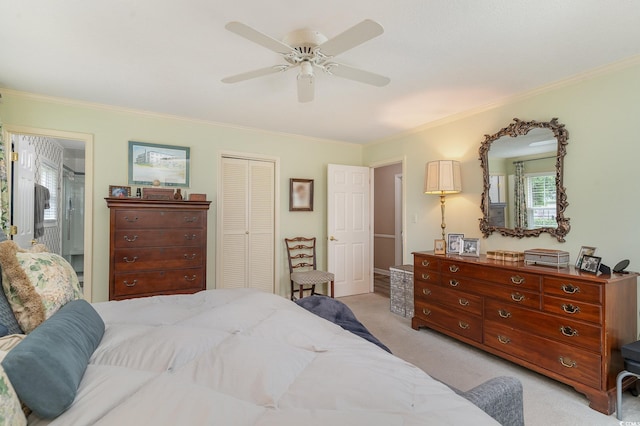 bedroom featuring crown molding, light carpet, a closet, and ceiling fan