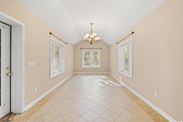 unfurnished room with light tile patterned floors, an inviting chandelier, and vaulted ceiling