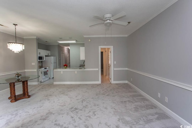 unfurnished living room with ornamental molding, light carpet, and ceiling fan