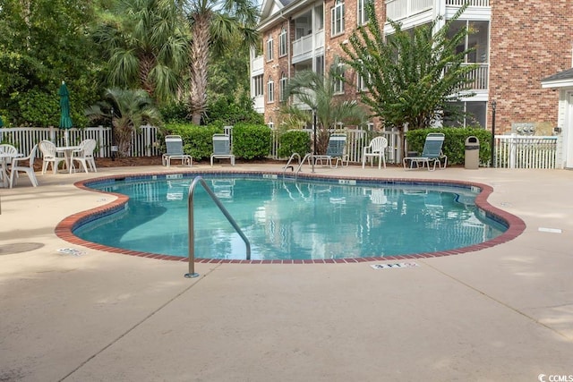 view of pool with a patio