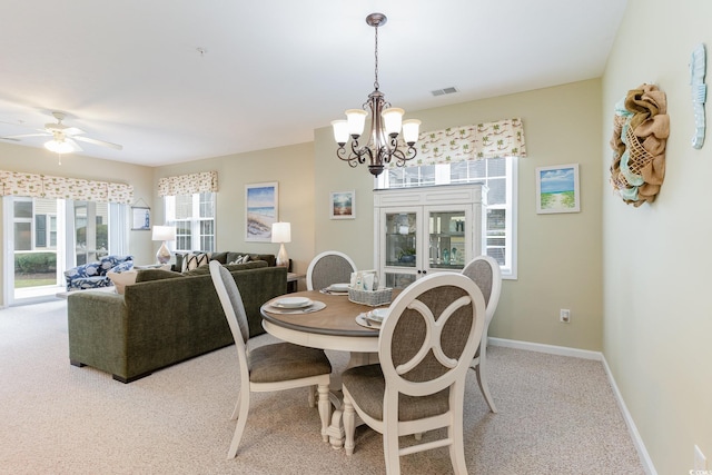 601 Hillside Dr N Unit 3906, North Myrtle Beach, SC 29582 - dining space featuring carpet floors, a chandelier, and ceiling fan