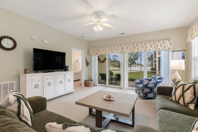 601 Hillside Dr N Unit 3906, North Myrtle Beach, SC 29582 - living area with light carpet and a ceiling fan