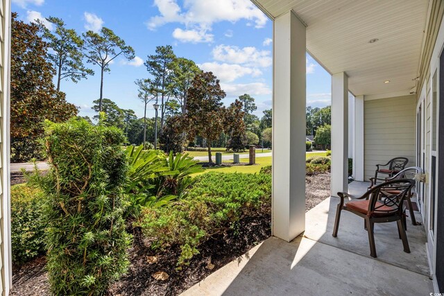 view of patio featuring a porch