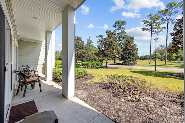 view of patio featuring a porch