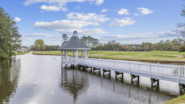 dock area featuring a gazebo and a water view