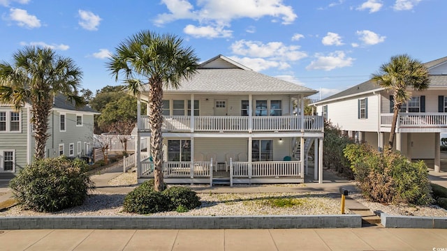 view of front of house with a balcony