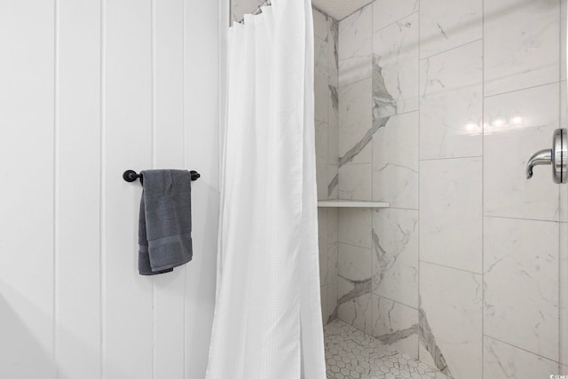 bathroom with a shower with shower curtain