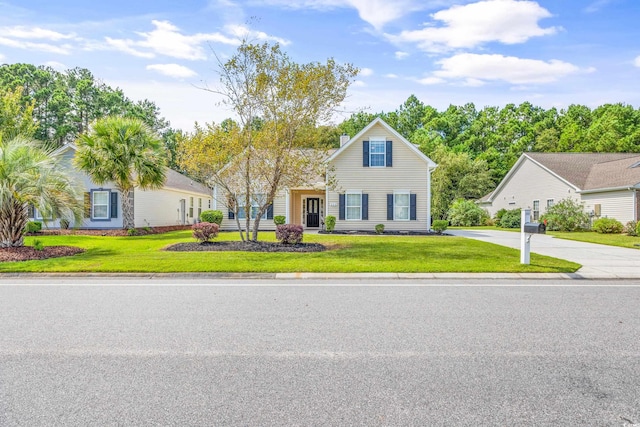 view of front of property featuring a front yard