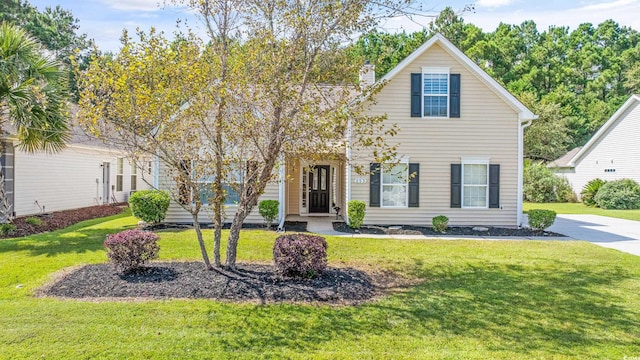 view of front of home with a front yard