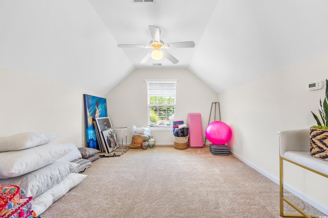 playroom with carpet, ceiling fan, and vaulted ceiling