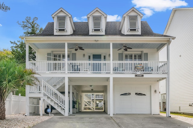 view of front of property with a porch and a garage