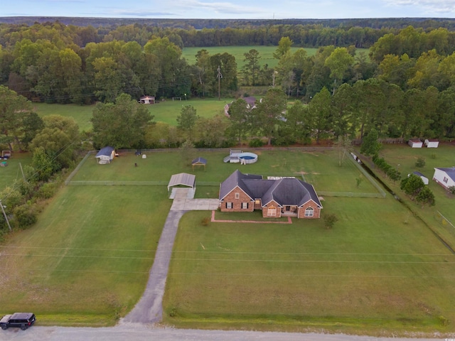 birds eye view of property with a rural view