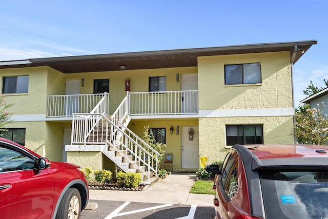 1301 Pridgen Rd Unit 1008, Myrtle Beach, SC 29577 - view of building exterior featuring uncovered parking and stairs