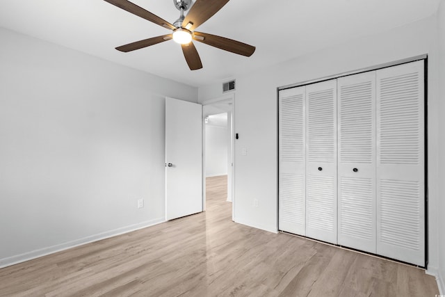 1301 Pridgen Rd Unit 1008, Myrtle Beach, SC 29577 - unfurnished bedroom with light wood-type flooring, a closet, and a ceiling fan