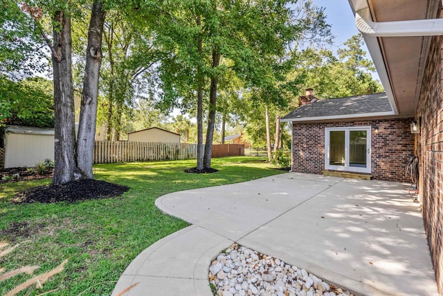 view of yard with a patio area